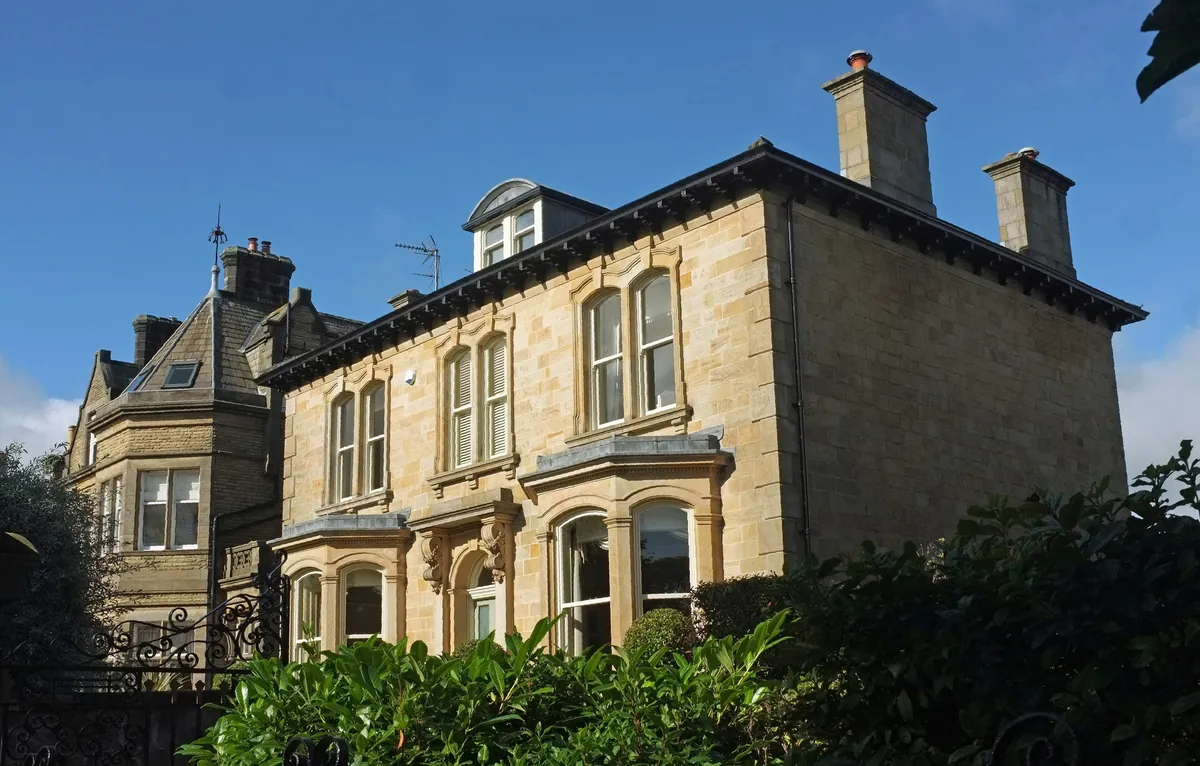 A large stone Victorian villa with bay windows on York Place, Harrogate
